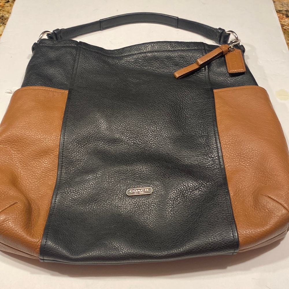 Coach pebbled leather hobo bag in great used condition black light brown
